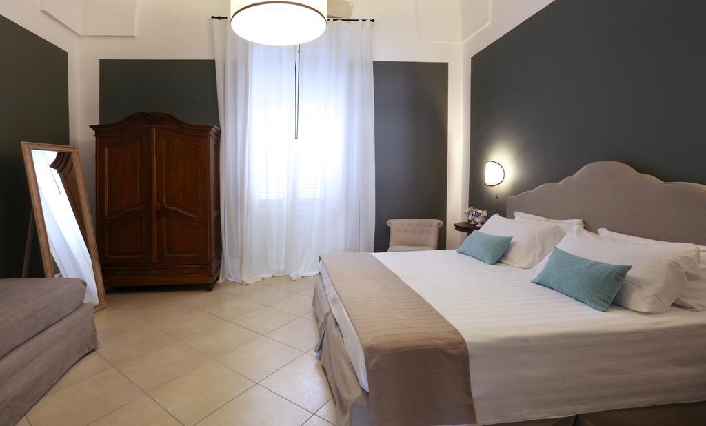 Santa Marta Suites & Apartments Lecce Quarto foto
